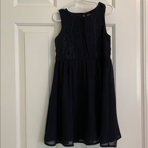 Navy Blue Dress with Lace Detail and Flowy Skirt